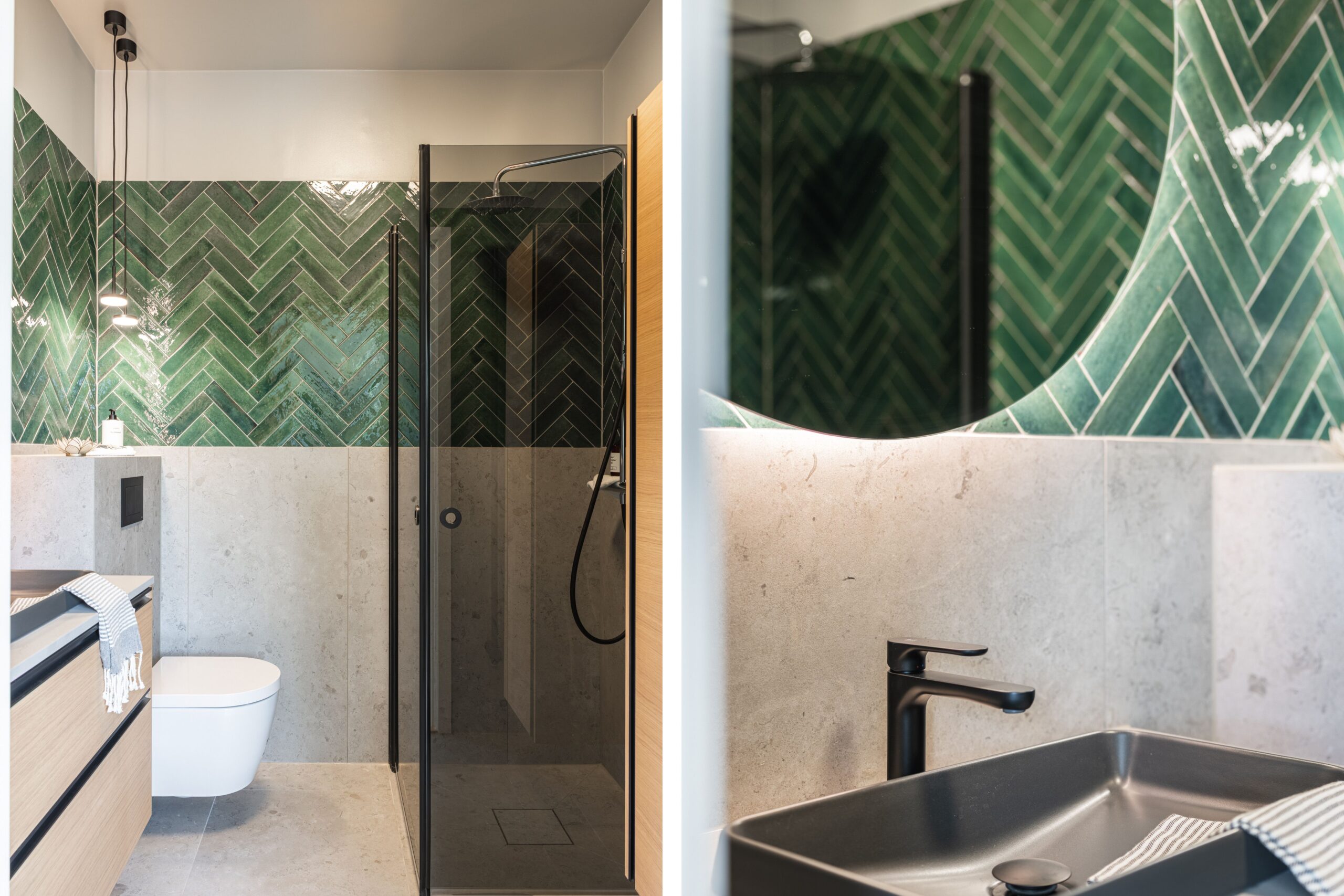 Ett elegant badrum med en vägg av grönt fiskbensmönstrat kakel, en minimalistisk toalett, och en mörk handfat med en svart kran.
